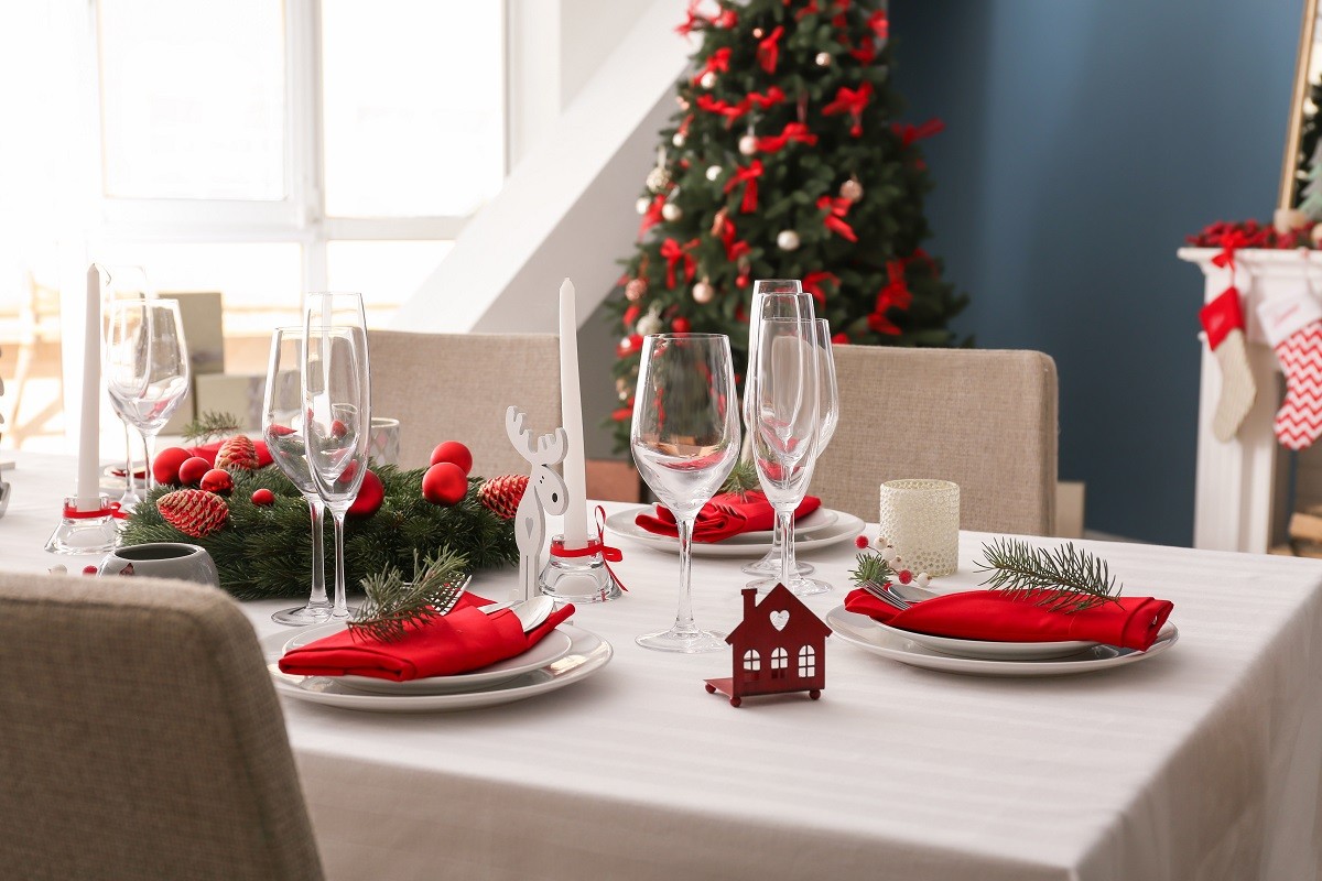Stylish table setting with Christmas decorations
