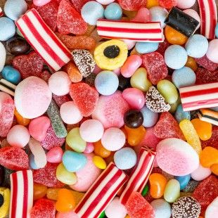41509556 – variety of candies as background