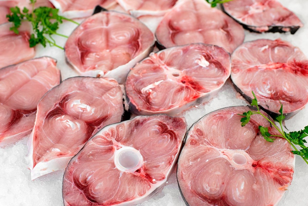 Sliced cutlets of fresh raw swordfish