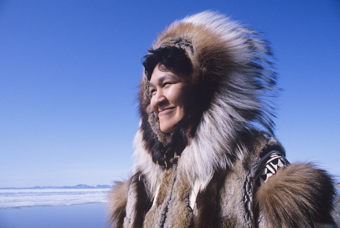 18897710 – smiling eskimo woman in traditional clothing