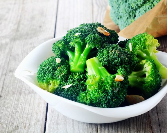 Flavored Steamed Broccoli on White Plate