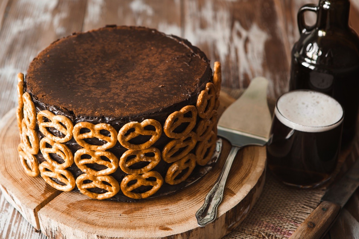 Сhocolate cake with ale decorated with salted pretzel