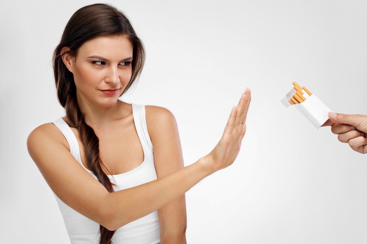 Beautiful Healthy Woman Quitting Smoking, Refusing Cigarettes.