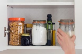 food cupboard, pantry with jars, hand