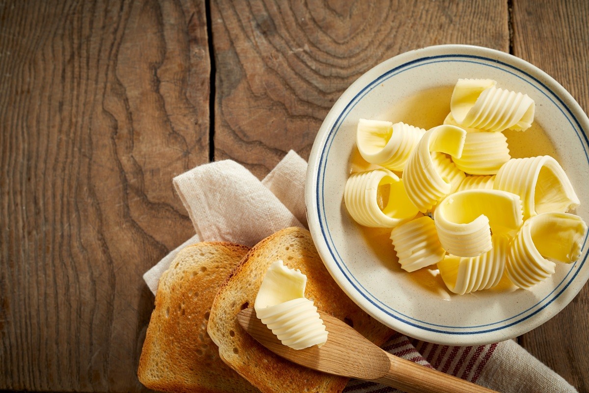 Dish of butter curls with crispy golden toast