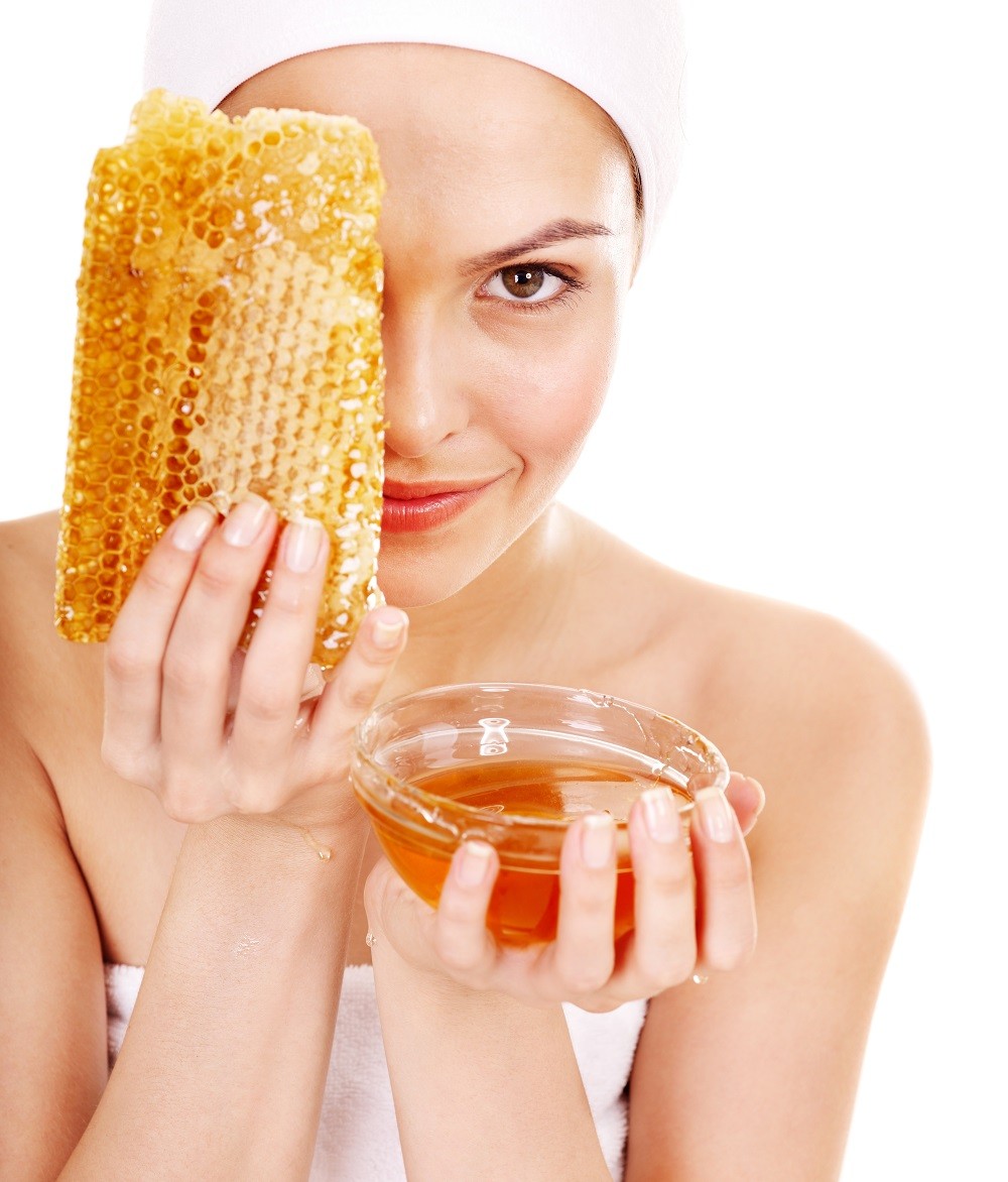 10701587 – natural homemade organic  facial masks of honey. isolated.
