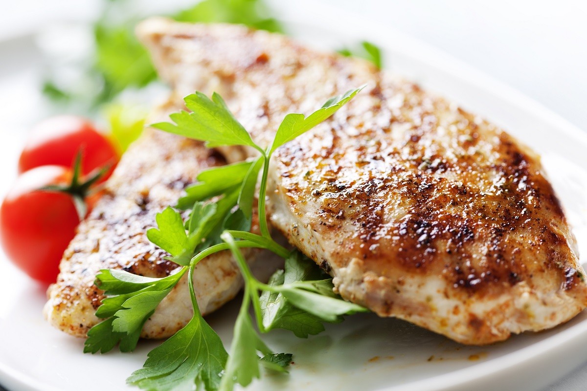 12615369 – closeup of juicy grilled chicken fillet