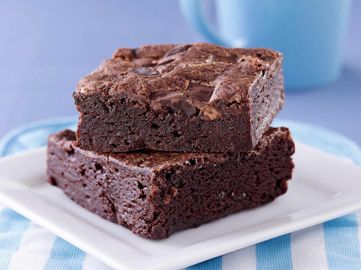 12925091 – two brownies stacked on a plate