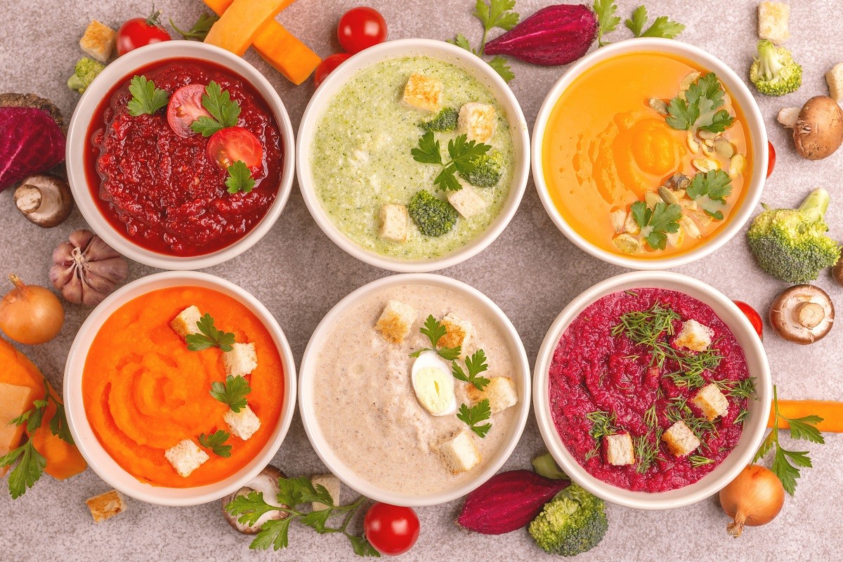 Variety of colorful tasty vegetables cream soups and fresh ingre
