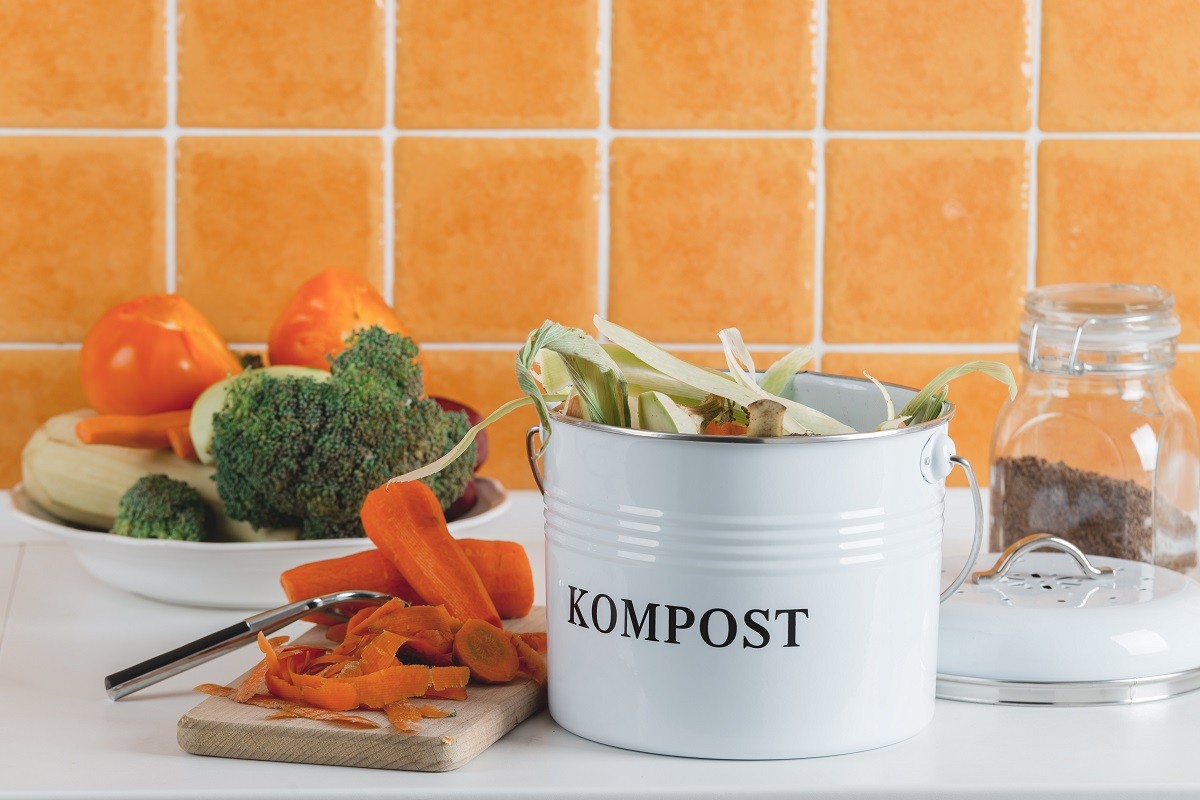 trash bin for composting with leftover in the kitchen