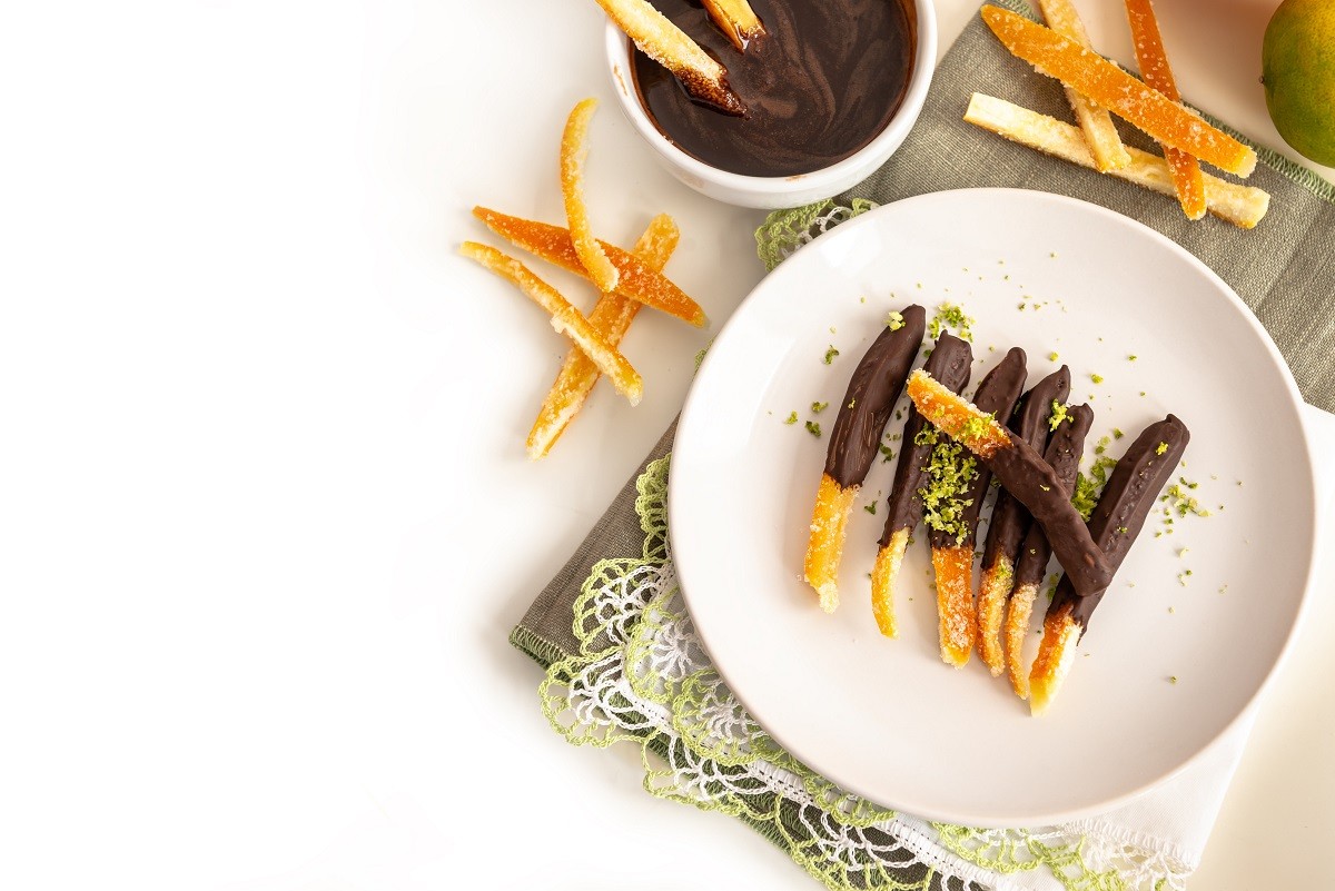Candied orange peel in chocolate or sugar is a favorite Christmas treat for children and adults