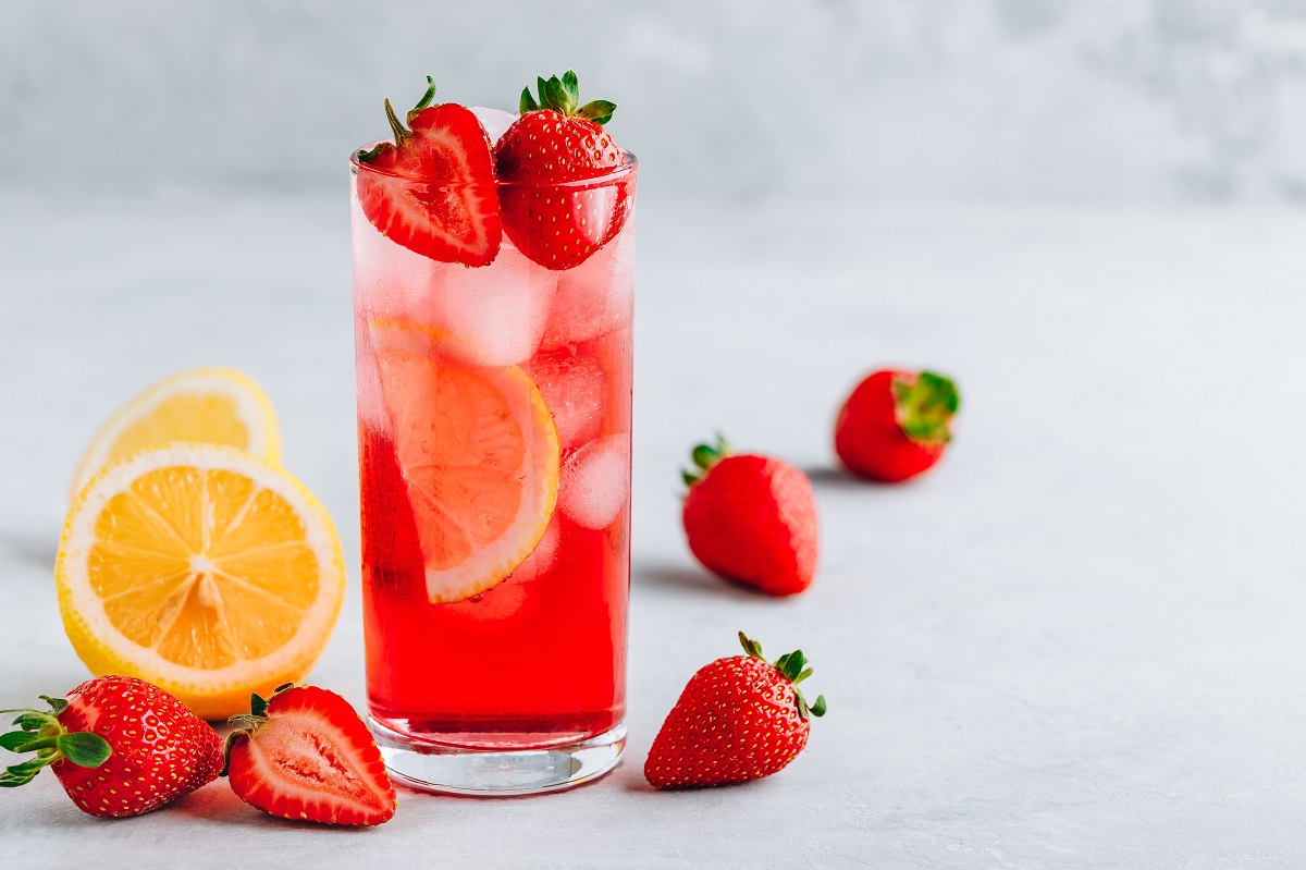 Refreshing Strawberry and lemon Iced Tea or lemonade in a glass