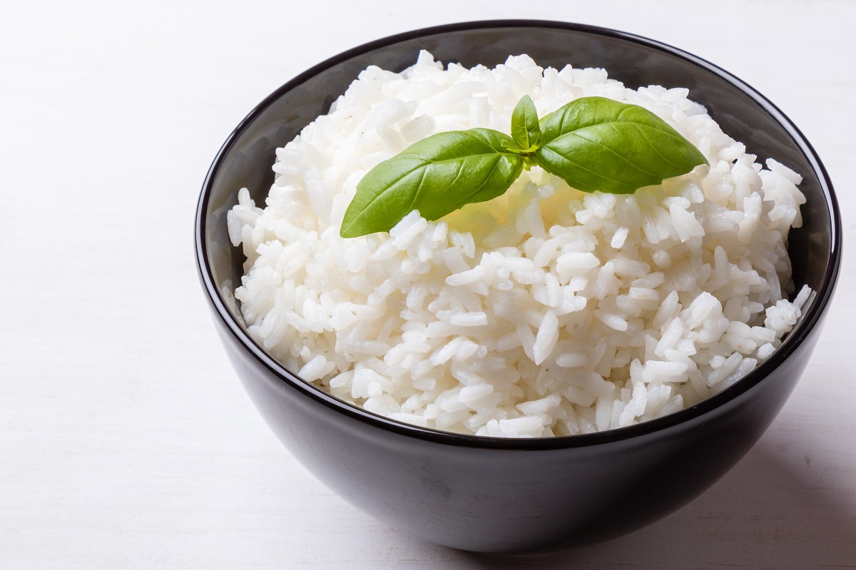 cooked rice in black bowl