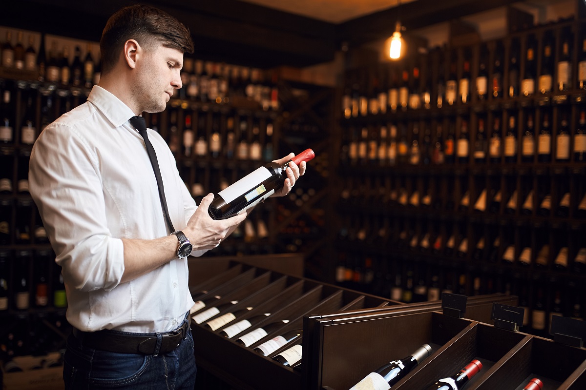 man is trained in wine tasting, pairing wine with foods, wine purchasing