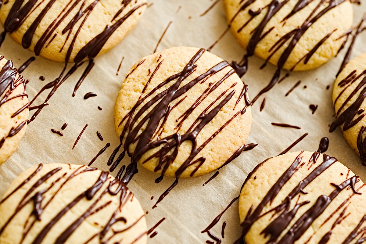 Shortbread,Cookies,With,Dark,Chocolate,Glaze,On,A,Baking,Paper.