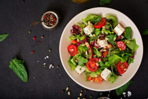 Dietary,Salad,With,Tomatoes,,Feta,,Lettuce,,Spinach,And,Pine,Nuts.