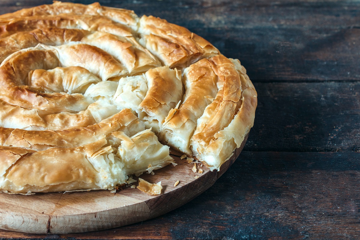 Baked,Homemade,Traditional,Greek,Cheese,Pie,On,Wooden,Background,selective,Focus