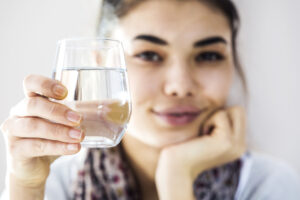 Young,Woman,Drinking,Water