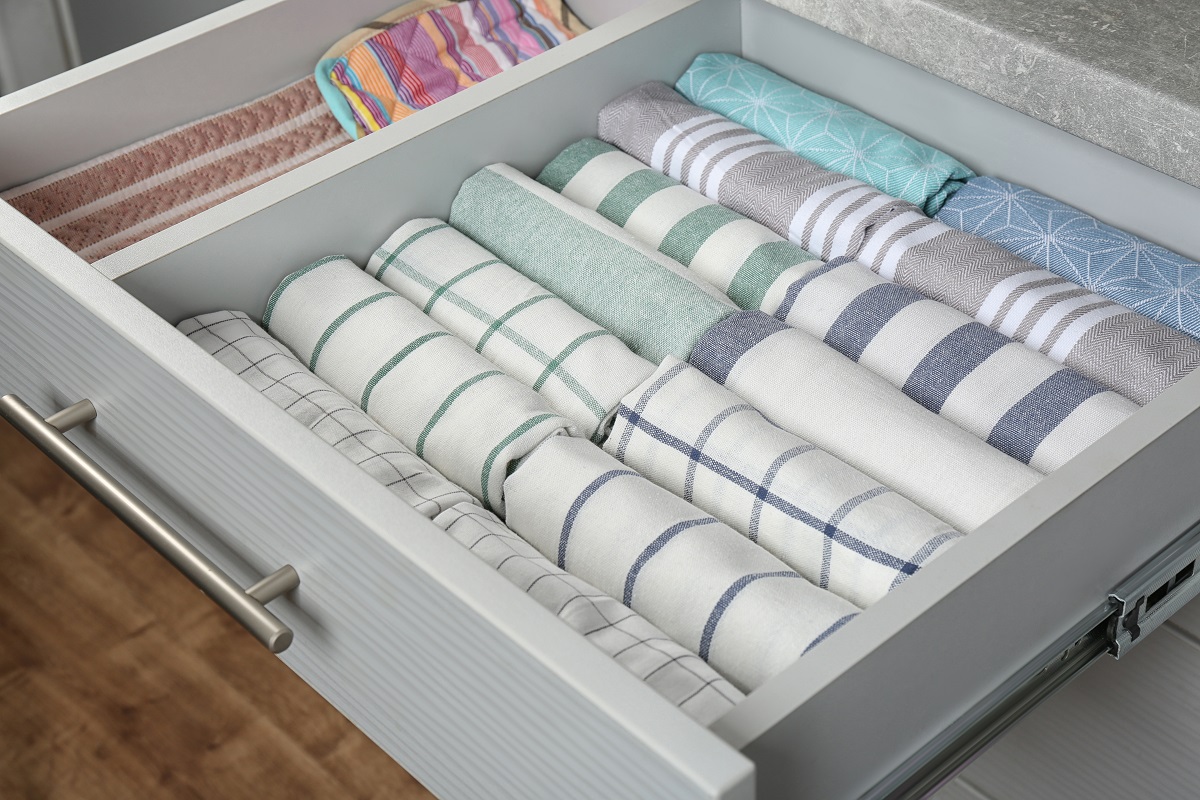 Open,Drawer,With,Folded,Towels.,Order,In,Kitchen