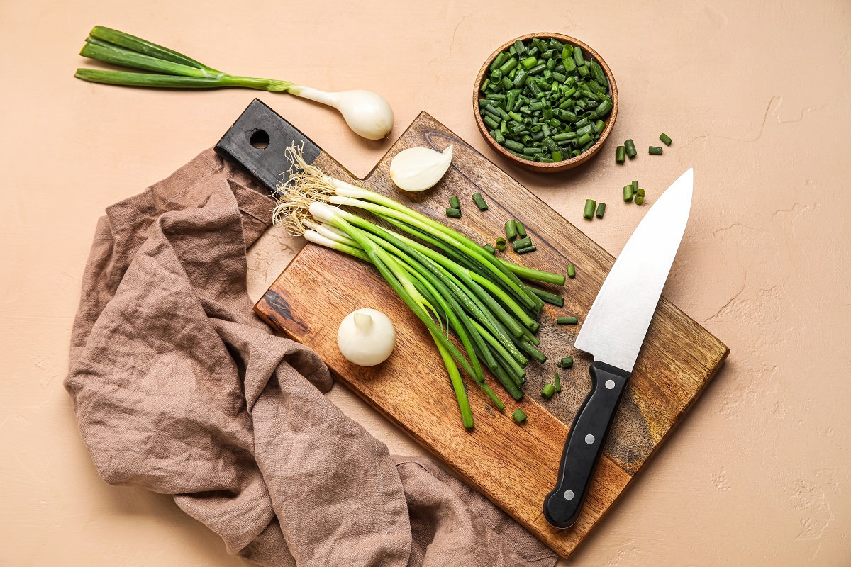 Composition,With,Green,Onion,On,Color,Background
