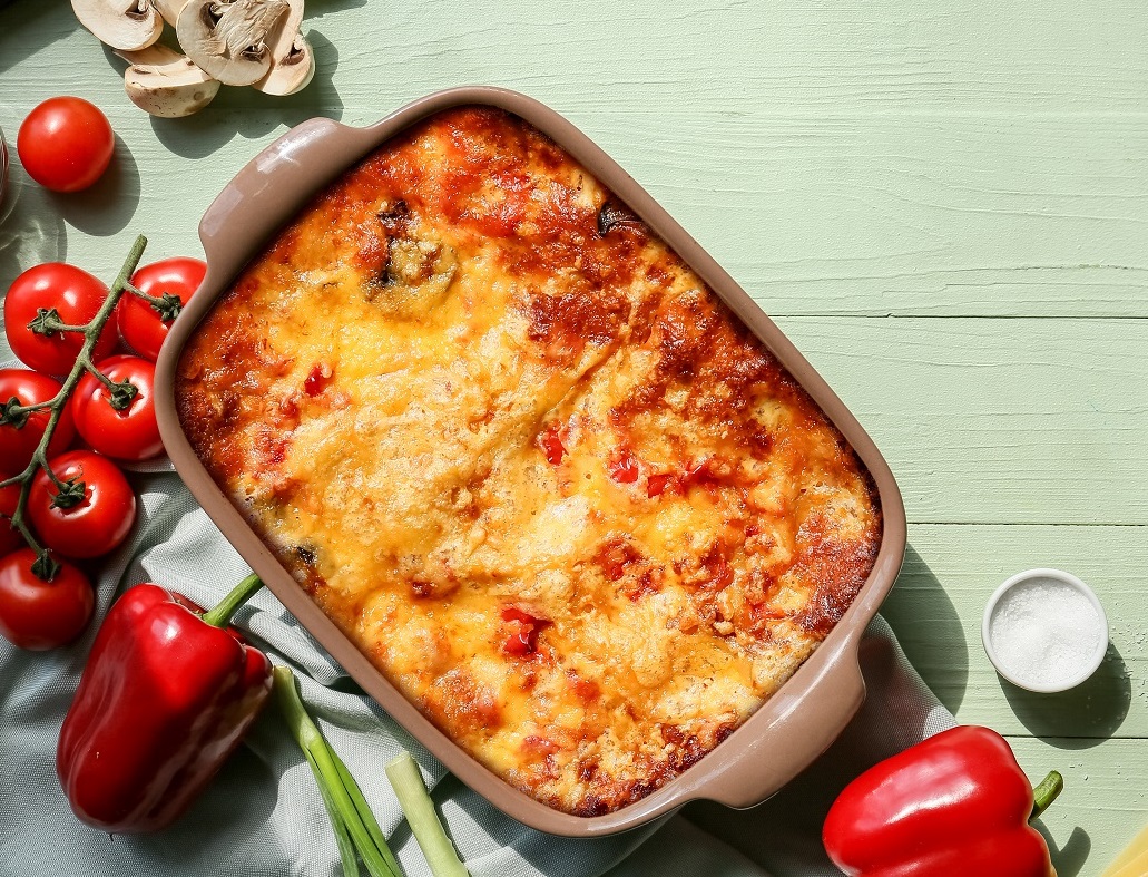 Composition,With,Tasty,Vegetable,Lasagna,On,Color,Wooden,Background