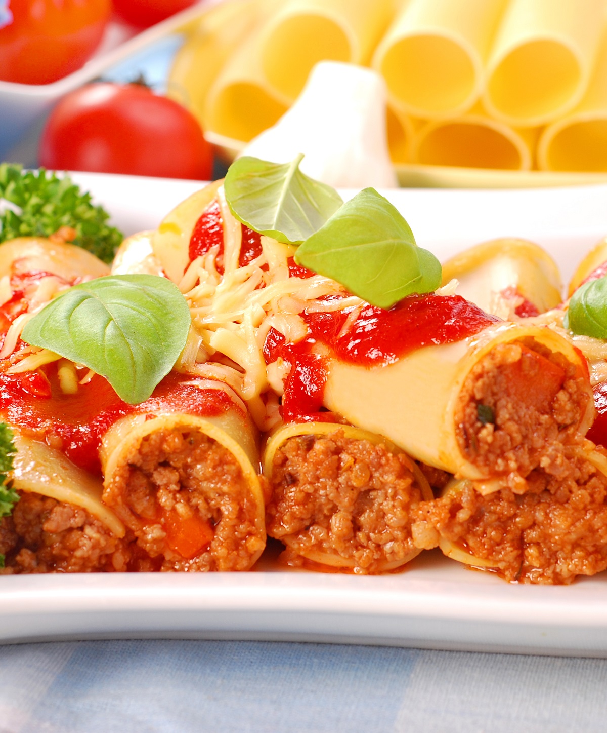 Italian,Cannelloni,Stuffed,With,Minced,Meat,Poured,Tomato,Sauce
