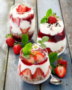 Assortment,Of,Creamy,Gourmet,Strawberry,Desserts,Layered,In,Decorative,Patterns