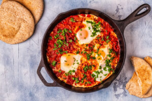 Shakshuka,In,A,Frying,Pan.,Eggs,Poached,In,Spicy,Tomato