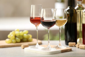 Different,Glasses,With,Wine,Served,On,Table