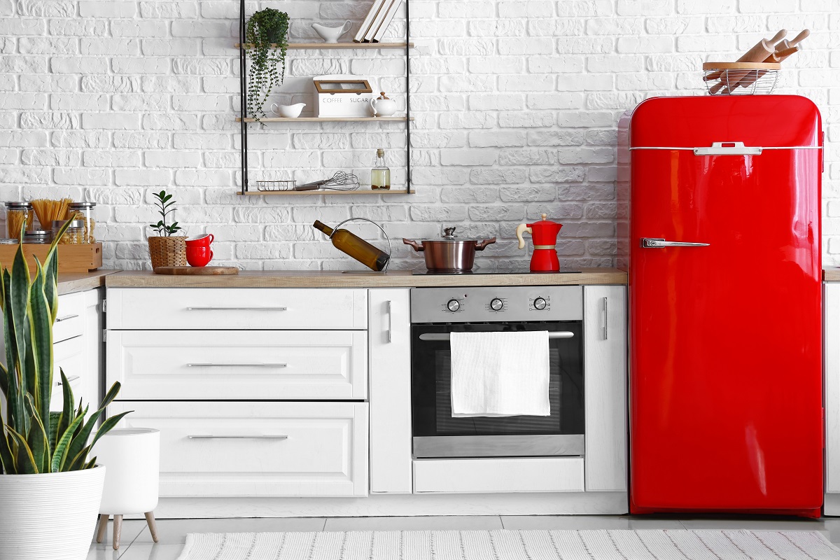 Interior,Of,Light,Kitchen,With,Red,Fridge,,White,Counters,And