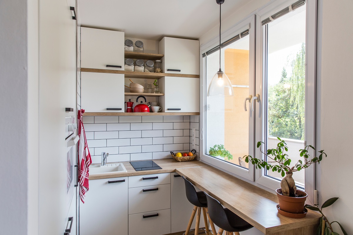 White,Tiny,Modern,Kitchen,With,Red,Components,,Reconstruction,,Cosy,Small