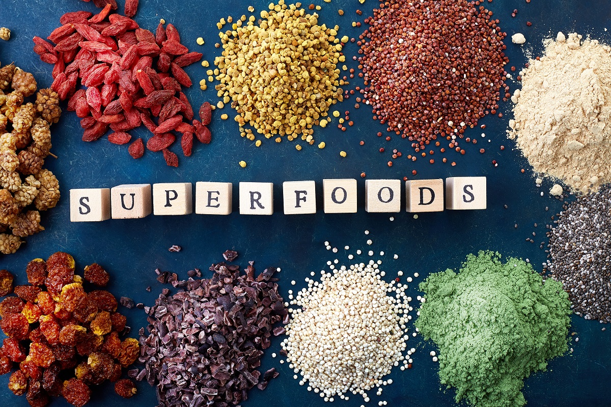 Various,Superfoods,On,Old,Blue,Background.,Top,View