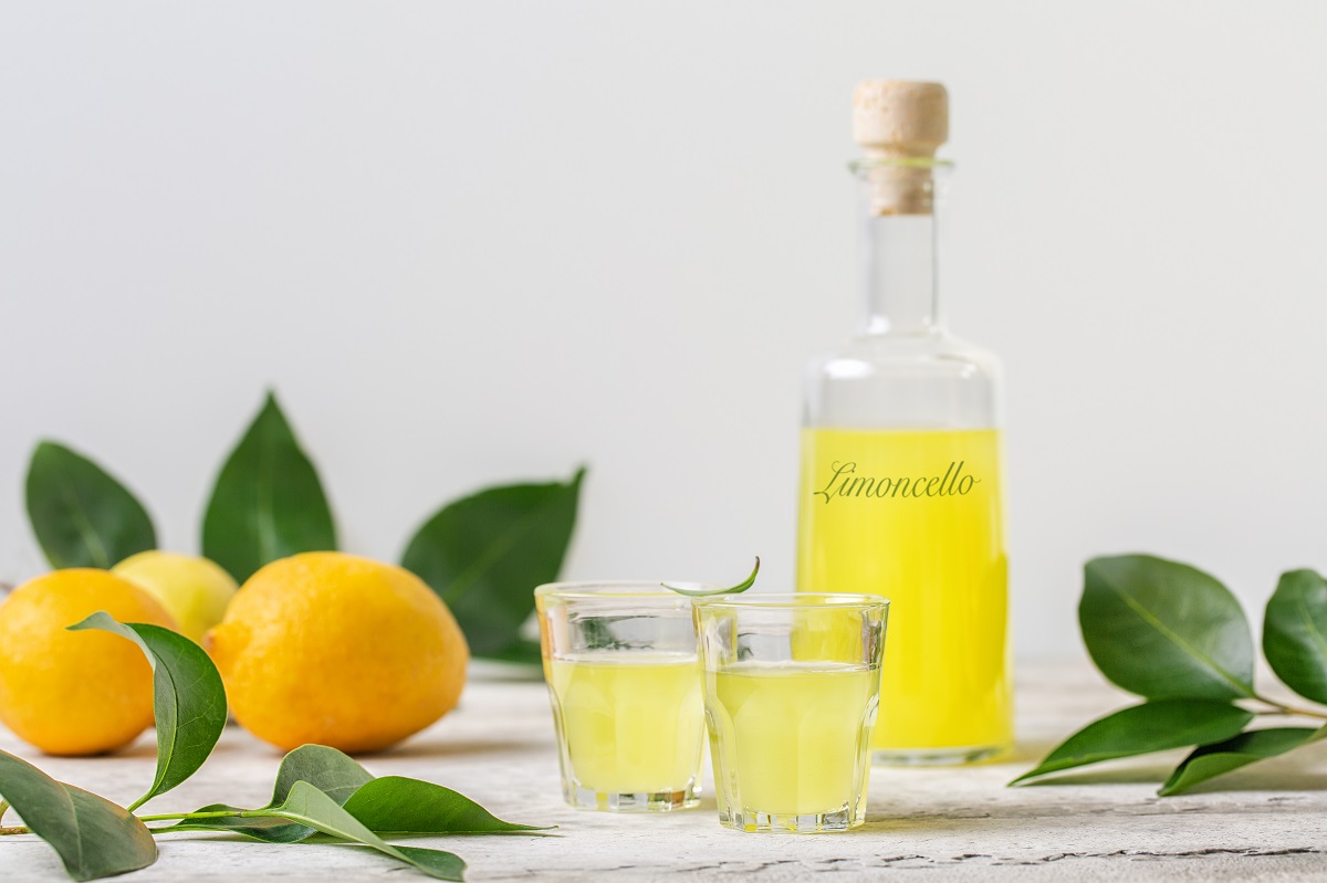 Limoncello,-,Italian,Lemon,Liqueur,,Fresh,Italian,Lemons.,Light,Background,