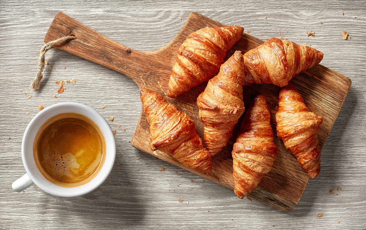 Freshly,Baked,Croissants,And,Coffee,Cup,On,Grey,Table,,Top