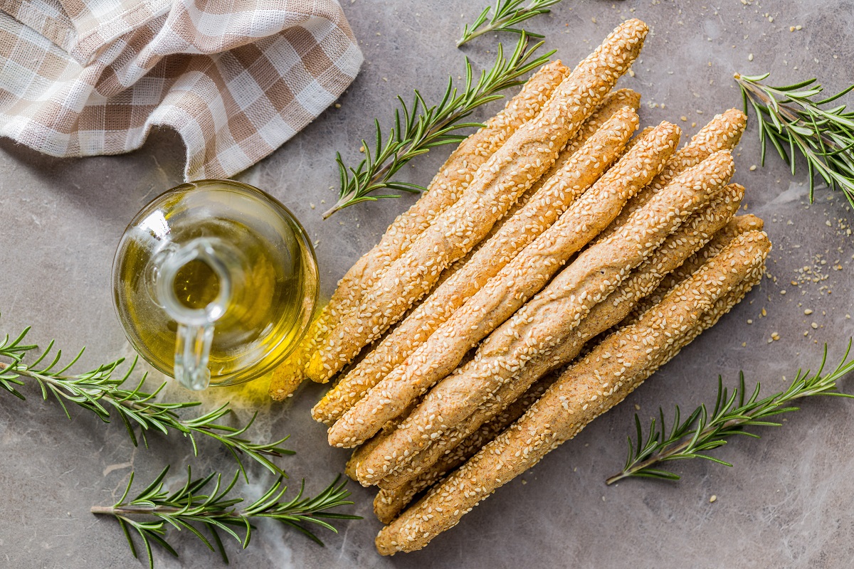 Italian,Grissini,Bread,Sticks,With,Sesame,Seeds,And,Rosemary,On