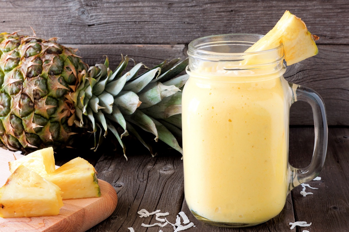 Tropical,Pineapple,Smoothie,In,A,Mason,Jar,,Scene,Against,An