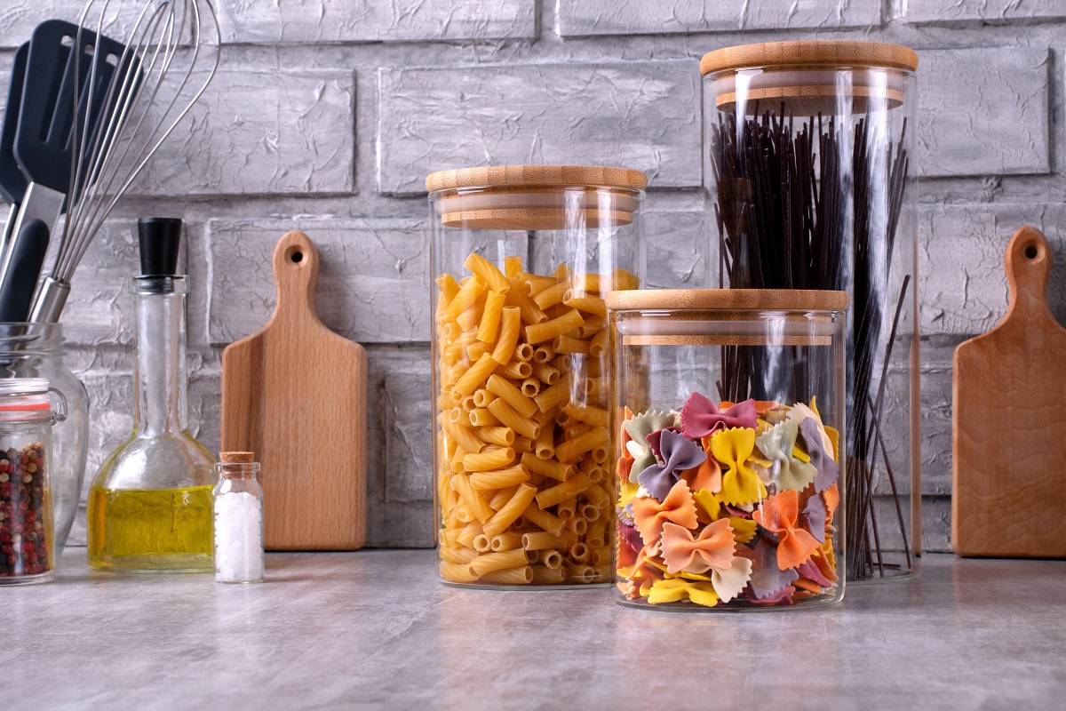 Storing,Pasta,Of,Three,Types,In,Glass,Jars,Against,The