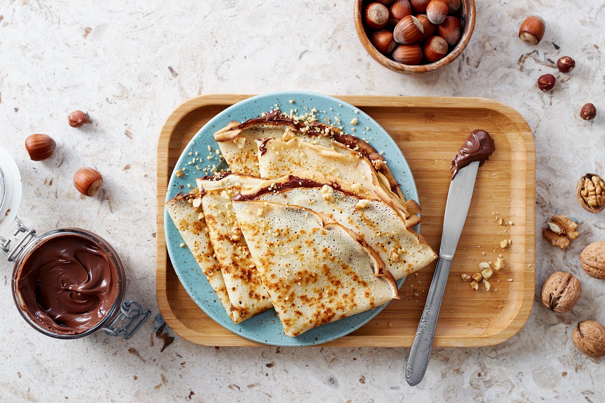 Homemade,Crepes,,Tasty,Thin,Pancakes,With,Chocolate,And,Nuts.