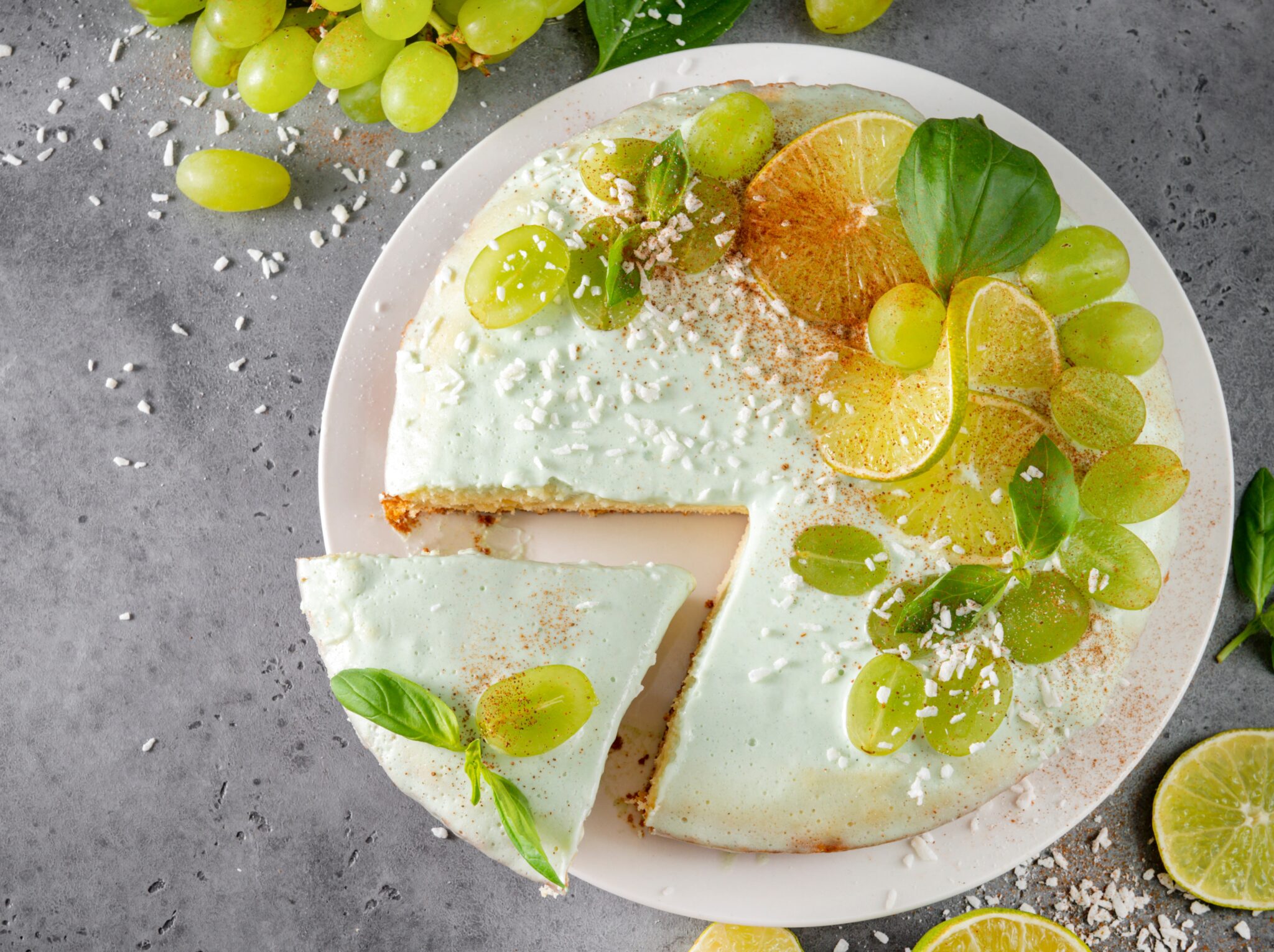 Homemade,Cake,,Pie,With,Grapes,,Lime,Slices,,Coconut,Shavings,,Green