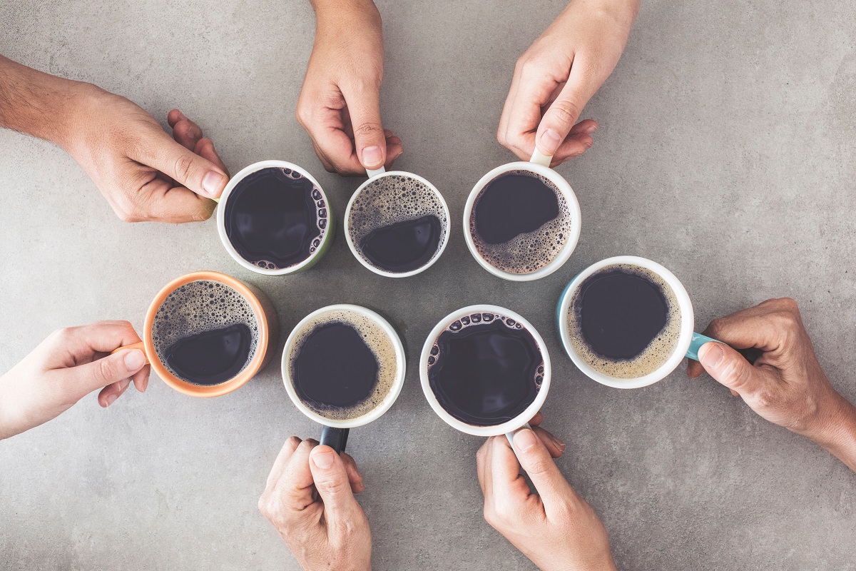People,Hands,Holding,Cups,Of,Coffee