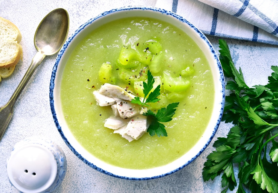 Celery,Soup,With,Chicken,In,A,Bowl,Over,Light,Slate,