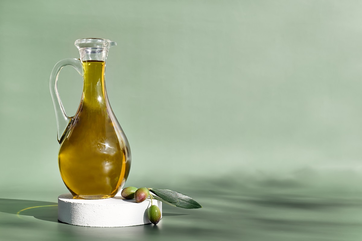 Extra,Virgin,Olive,Oil,And,Olive,Branch,In,The,Bottle