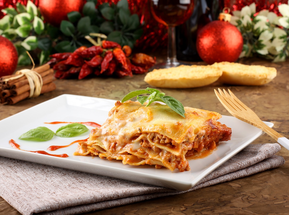 Lasagna,With,Tomato,And,Bechamel,Sauce,On,Complex,Background