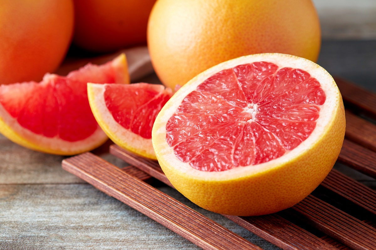 Fresh,Raw,Grapefruit,(citrus,X,Paradisi),On,Wooden,Background