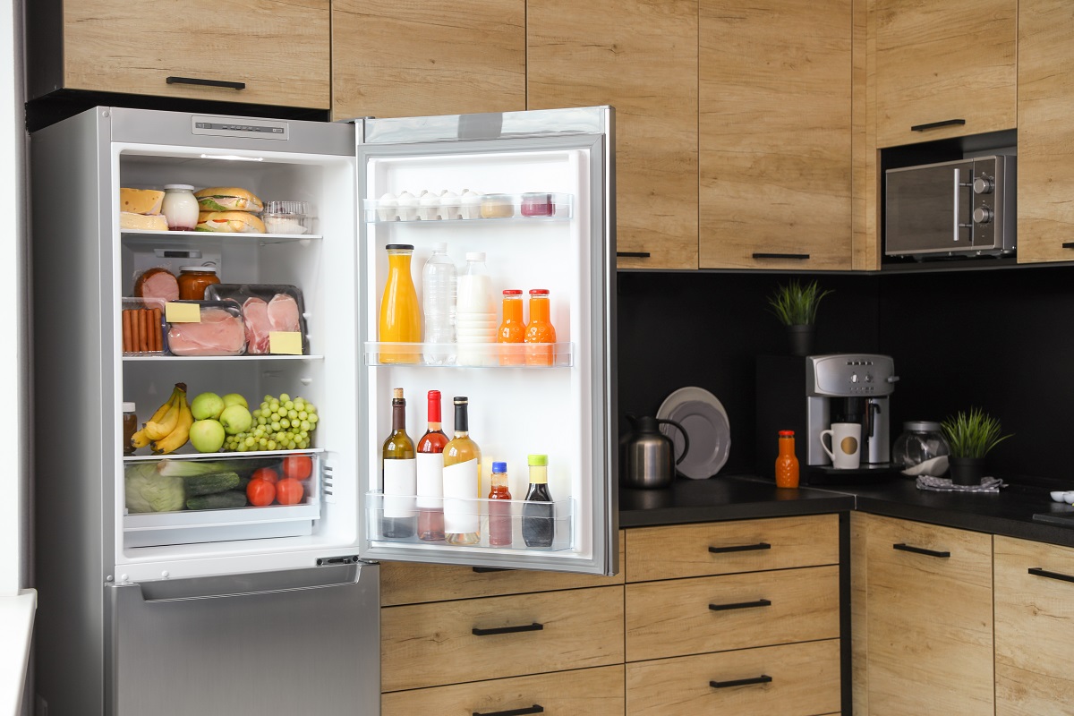 Open,Refrigerator,Full,Of,Products,In,Kitchen
