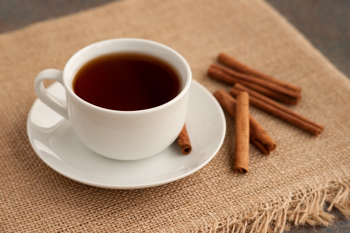 Cup,Of,Tea,And,Cinnamon,On,Sacking.,Tea,With,A