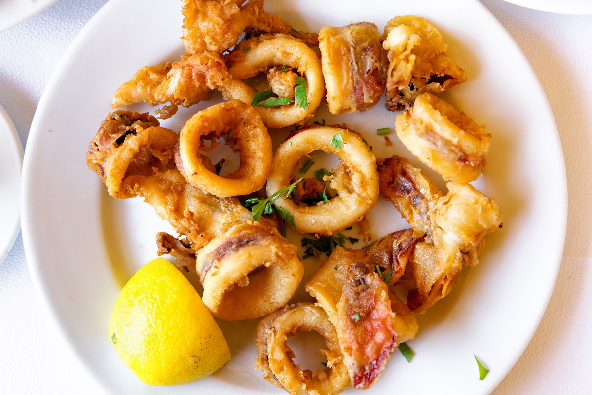 Top,View,Of,Seafood,Meal.,Fried,Squids,With,Slice,Of