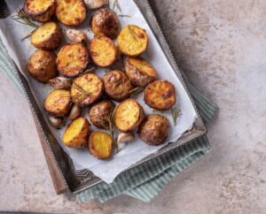 Roasted,Potato,With,Rosemary,On,A,Baking,Sheet